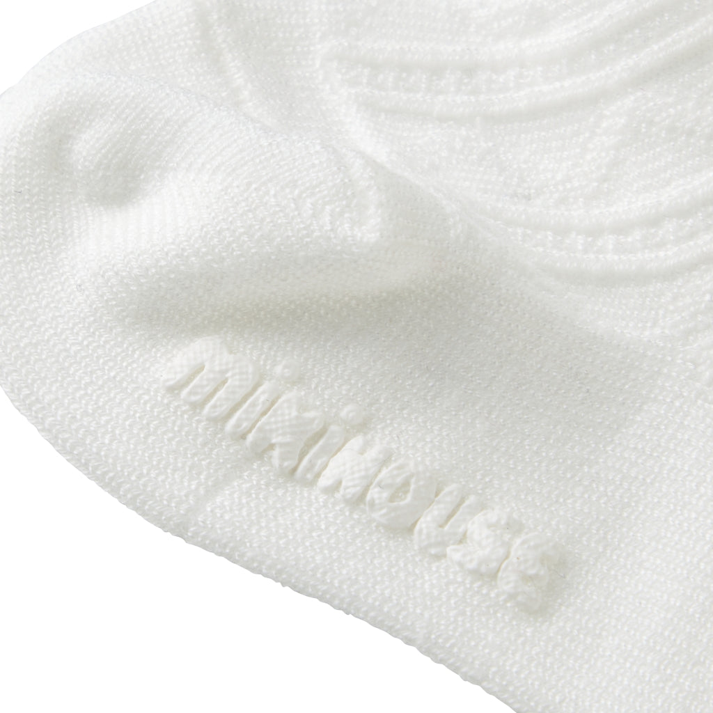 CHAUSSETTES BÉBÉS BLANCHES AVEC DENTELLE