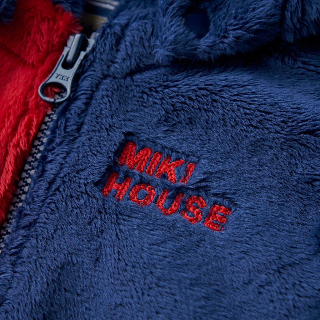 VESTE EN COTON ROUGE ET BLEU SANS MANCHE AVEC CAPUCHE FORME OURSON MIKI HOUSE