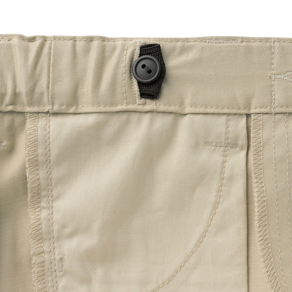 PANTALON BEIGE AVEC REVERS À CARREAUX