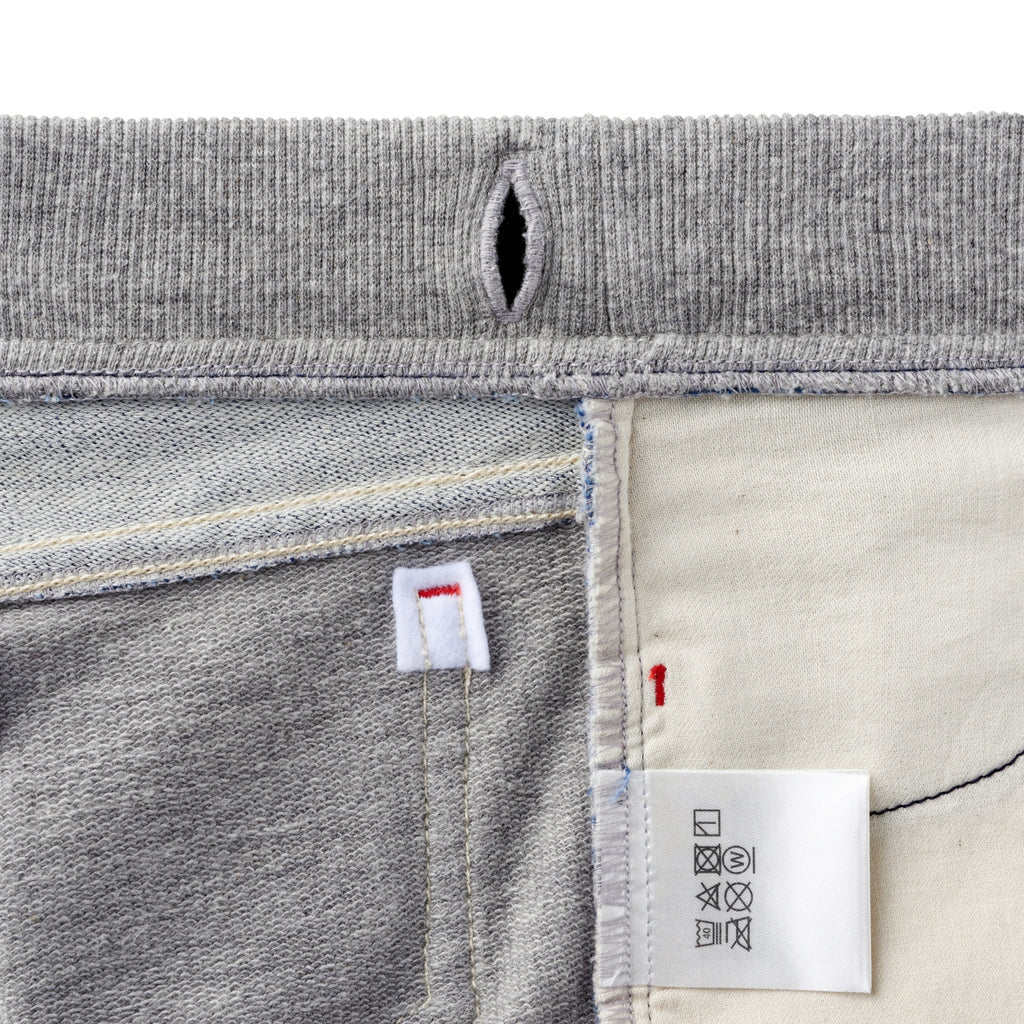 PANTALON BLEU AVEC DES PATCHS DOUBLE B