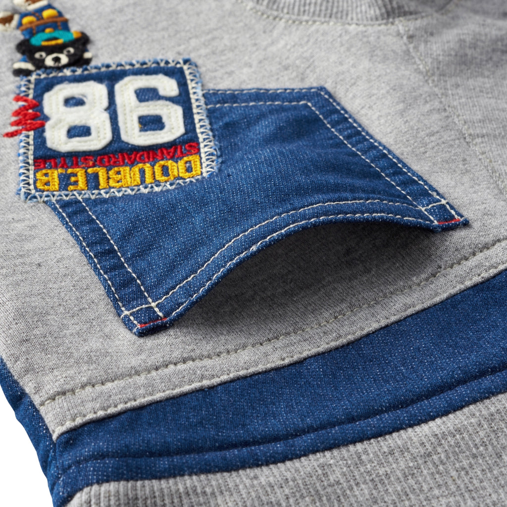 PANTALON BLEU AVEC DES PATCHS DOUBLE B